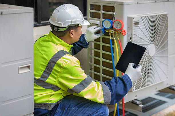 Professional Hvac technician working in Maynard, MA